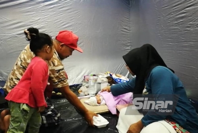 Rashid dan Suria tidak menyangka kedua-dua anak mereka menjalani tempoh 'berpantang' buat beberapa hari di PPS.