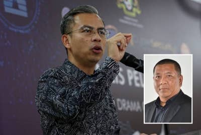 Fahmi (Gambar kecil: Nik Justin)