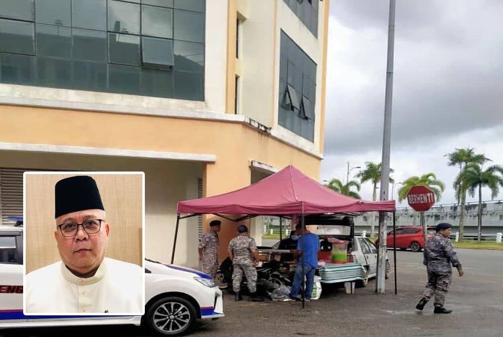 Anggota penguat kuasa menegur penjaja kerana berniaga di selekoh dan simpang jalan. - Foto MPKB-BRI (Gambar dalam : Rosnazli)