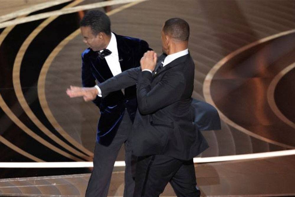 Chris mengaku layangan lempang yang singgah di mukanya menyakitkan. - Foto Reuters