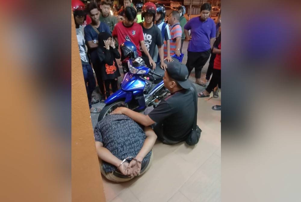 Peragut ditahan oleh orang awam ketika cuba melarikan diri.