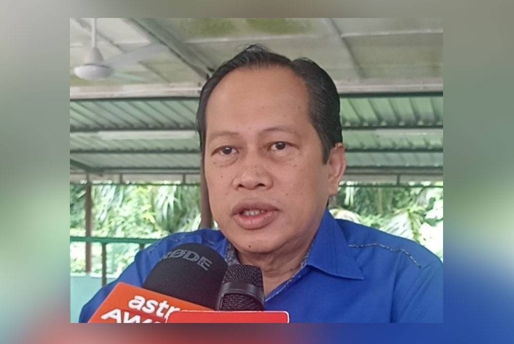 AHMAD MASLAN