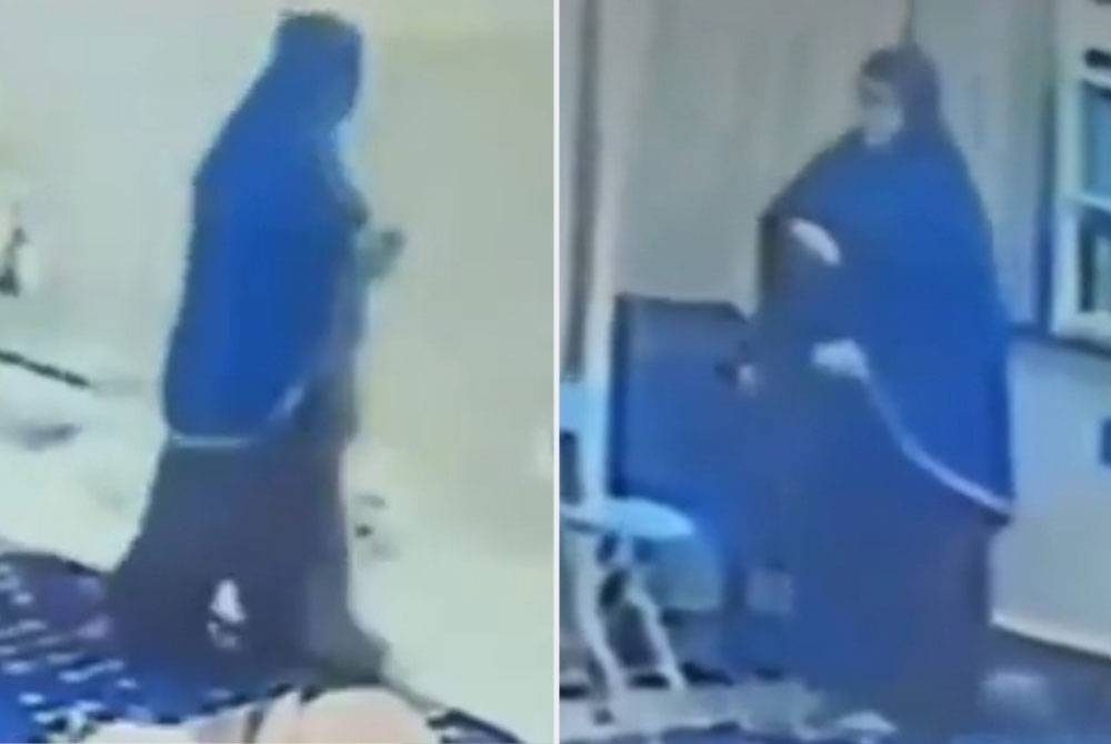 Tangkap layar video tular memaparkan perbuatan seorang wanita mencuri barangan milik jemaah wanita yang sedang solat Isyak di Masjid Taman Temerloh Jaya pada Sabtu lalu.