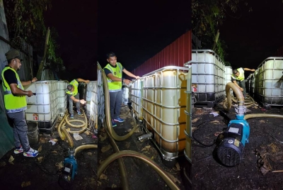 Anggota penguat kuasa KPDN memeriksa minyak diesel bersubsidi dan peralatan digunakan pihak tidak bertanggungjawab dalam satu serbuan di Semenyih, Selangor pada Selasa.