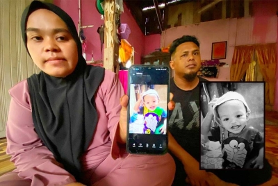 Nur Ain Nabihah dan suami menunjukkan gambar terakhir Muhammad Azim yang sempat dirakam di rumah mereka di Lorong Pondok Haji Muhammad, Selising, Pasir Puteh. (Gambar kecil: Muhammad Azim)