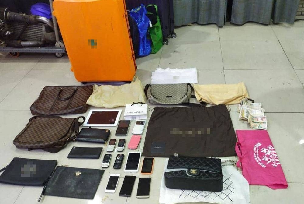 Sebahagian barangan berjenama yang disyaki dilarikan kumpulan jenayah itu selepas pecah masuk kediaman.