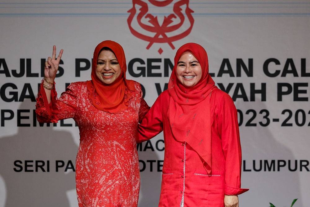 Noraini (kanan) dan Shahrizat (kiri).