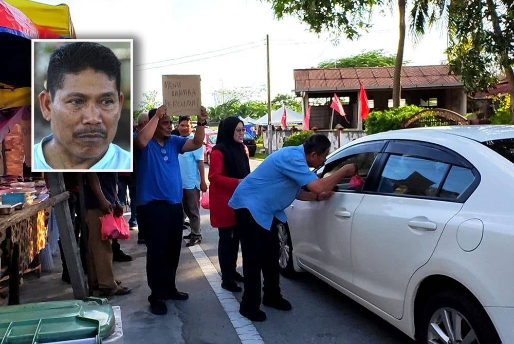 UMNO Seremban mengagihkan 200 Nasi Kandar Rahmah percuma kepada orang ramai termasuk pemandu kenderaan.. (Gambar kecil: Mazalan)