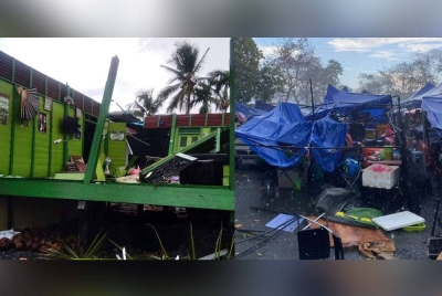 Sebuah rumah lompong selepas bumbung diterbangkan angin dalam kejadian ribut petang Rabu. Antara gerai jualan yang musnah dalam kejadian ribut pada Rabu. - Foto: (ihsan pembaca)