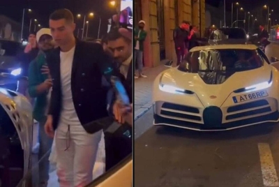 Ronaldo bersama kereta mewah Bugatti. - Foto Agensi