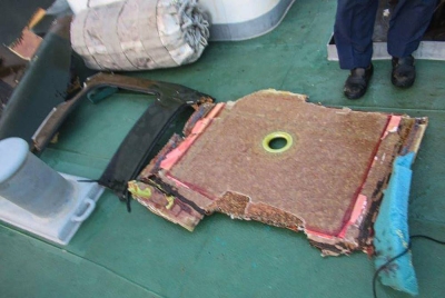 Beberapa objek yang ditemui dipercayai daripada helikopter GSDF Jepun yang hilang pada petang Khamis di perairan wilayah barat daya Okinawa. - Foto AFP