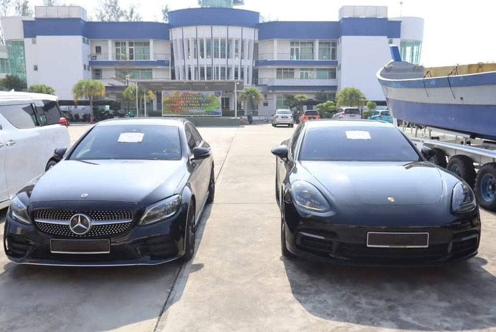 Antara kenderaan mewah yang dirampas dalam serbuan dadah, baru-baru ini.