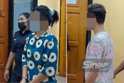 Suspek wanita dan lelaki (kanan) dibawa ke Mahkamah Majistret Teluk Intan pada Rabu bagi mendapatkan perintah reman untuk siasatan mengikut Akta Dadah Berbahaya 1952.