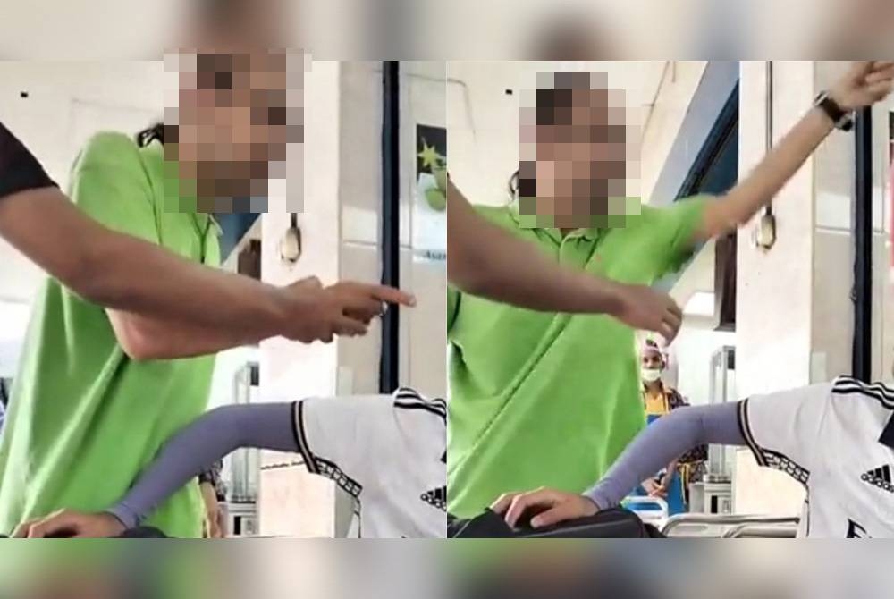 Rakaman video menunjukkan seorang lelaki memarahi seorang remaja lelaki yang menegurnya merokok dalam sebuah kedai makan.