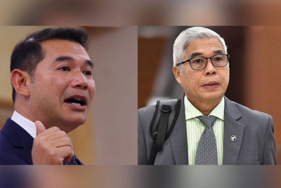 Rafizi Ramli (kiri), Hassan Karim.