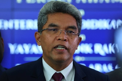 Pkharuddin ketika sidang media pada Majlis Pemeteraian MoU antara Kementerian Pendidikan dan Yayasan Bank Rakyat di Kompleks E Kementerian Pendidikan pada Isnin. - Foto Bernama