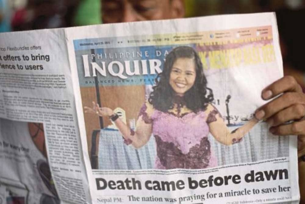 La vie et la mort à nouveau... Le journal Inquirer a publié la nouvelle de la mort de Mary Jane en première page.  - Agence