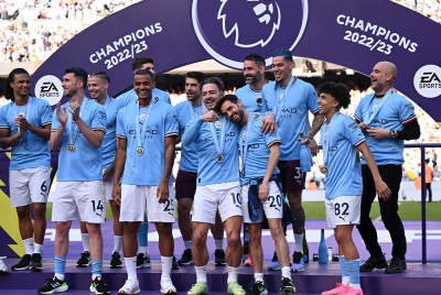 City memasang impian merangkul gelaran treble selepas memenangi kejuaraan EPL. Foto AFP.