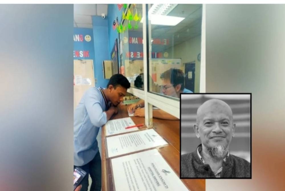 Muhammad Hafidz (kiri) menerima penerangan daripada petugas Unit Perubatan Forensik Hospital Ampang berkenaan bapanya, Ahmad Fadzil (gambar kecil) yang meninggal dunia akibat terbabas dan jatuh daripada jejambat SUKE pada Rabu.