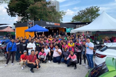 Sebahagian daripada 200 rider p-hailing yang menerima manfaat servis motosikal percuma anjuran Persatuan Pengguna Komunikasi Media pada Sabtu.