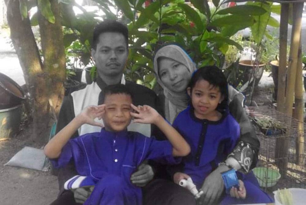 Kemalangan di Jalan Gerik-Jeli meragut nyawa Rohaya dan suaminya, Mohamad Nasir pada Sabtu. - Foto ihsan pembaca