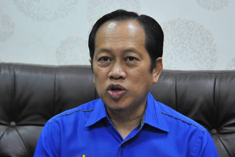 AHMAD MASLAN