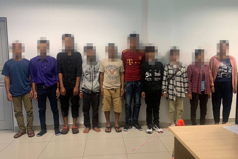 PATI yang ditahan di ruang menunggu di Stesen Bas Bandar Tasek Raja, Pasir Mas pada Khamis.