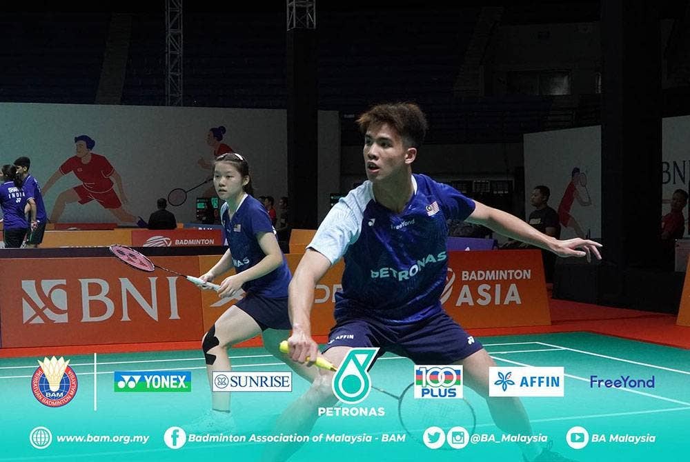 Brian Goonting-Chan Wen Tse menghadiahkan mata pertama pasukan Malaysia.