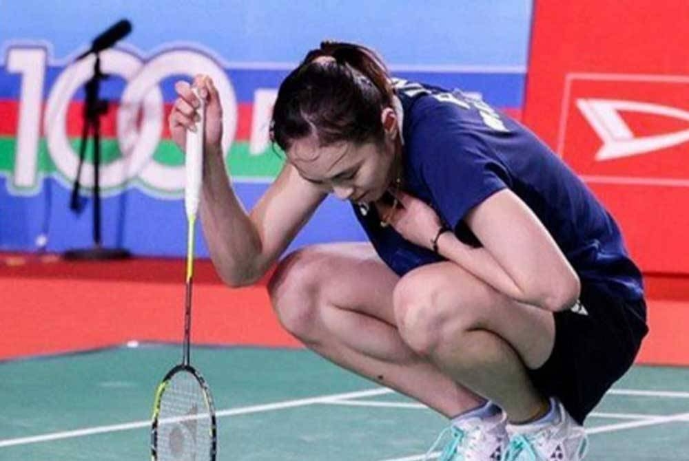 Pearly mengalami kecederaan pada Terbuka Singapura 2023 awal bulan lepas. - Foto Agensi