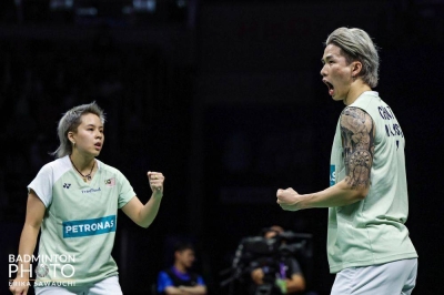 Ee Wei (kiri) dan Tang Jie. - Foto Badminton Photo