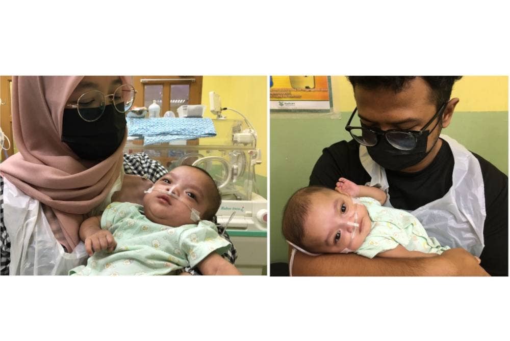 Erma Eafah Aisah dan suami, Mohd Syahmi bersama bayi kembar mereka yang kini sedang bertarung nyawa dan memerlukan dana RM38,000 bagi membeli vaksin Synagis Palivizumab untuk meneruskan hidup mereka.