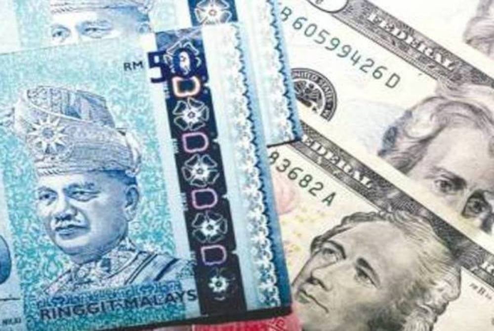 he ringgit closed lower against the greenback today, weighed by a stronger US dollar due to better macro data from the United States (US) and renewed interest in safe-haven currencies.