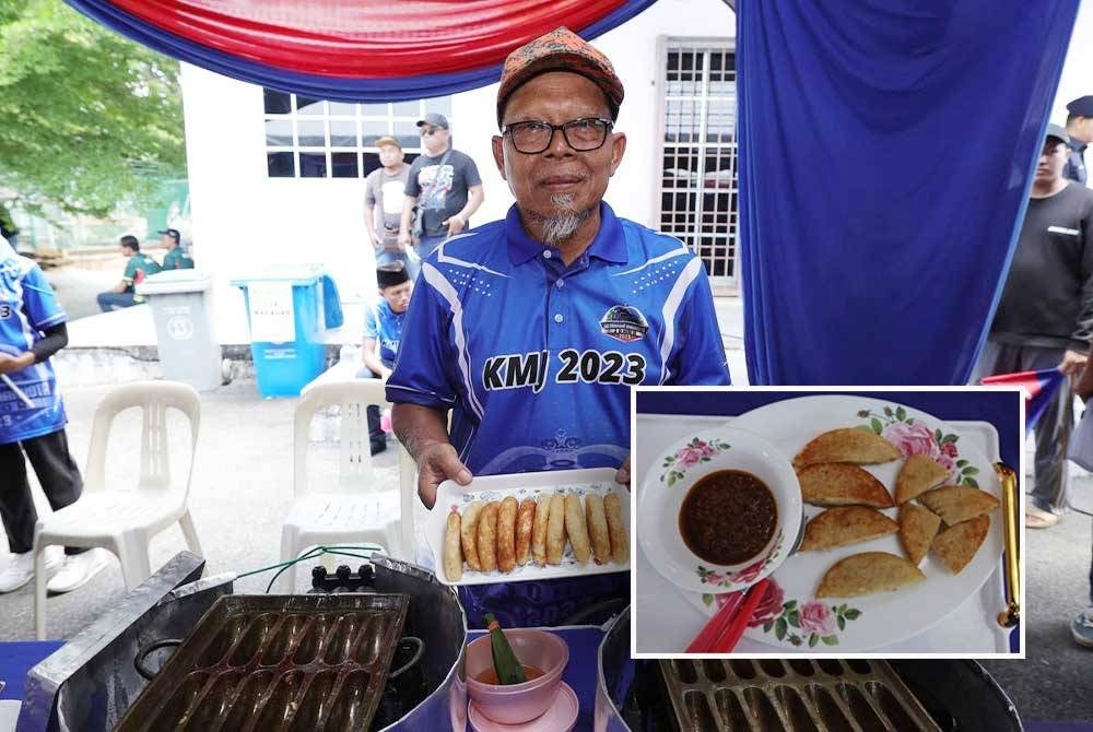 Md Jamil menunjukkan kuih gandus yang telah siap dimasak di Kompleks Penghulu Mukim Ayer Hitam, Muar pada Isnin. - Foto Kelab Media Johor
