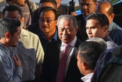 Mahkamah Tinggi hari ini melepas dan membebaskan Muhyiddin daripada empat pertuduhan yang mendakwa beliau menggunakan kedudukannya untuk suapan berjumlah RM232.5 juta bagi parti Bersatu. - Foto Bernama