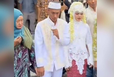 Klip video majlis pernikahan pasangan tersebut sudah meraih kira-kira 8.5 juta tontonan di TikTok. - Foto: Agensi