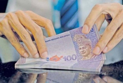 Ringgit diniagakan lebih rendah berbanding dolar AS sewaktu dibuka pada Khamis. - Gambar hiasan