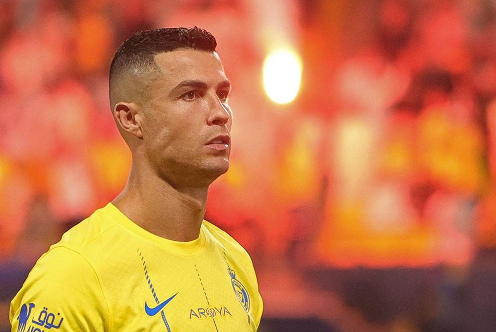 Ronaldo gagal membantu Al-Nassr apabila tewas 0-2 kepada Al-Taawoun dalam aksi Liga Pro Saudi pada Sabtu. - Foto AFP