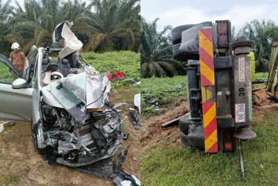 Keadaan Honda Freed dan sebuah lori remuk selepas terlibat kemalangan dengan sebuah lori di Ladang Cenas, Bandar Tenggara pada Isnin.