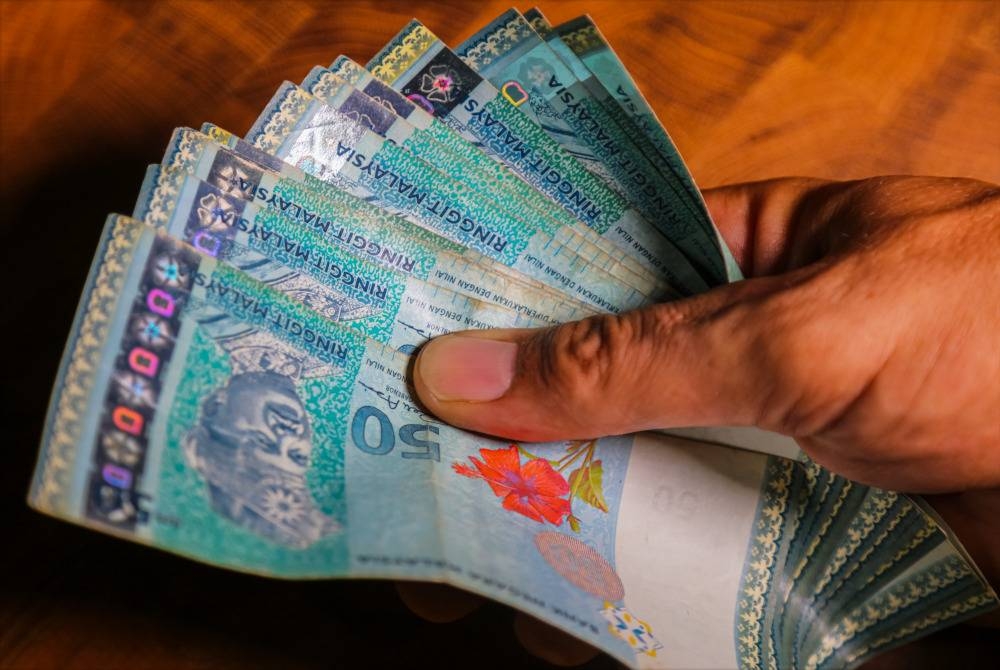 Pada 6 petang, unit tempatan meningkat kepada 4.6455/6475 berbanding dolar AS daripada 4.6535/6565 pada penutup Isnin. - Foto hiasan 123RF