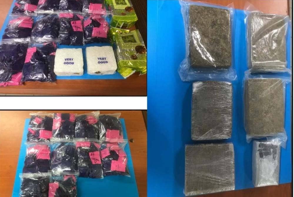 Pemeriksaan kedua berjaya menemukan lebih lapan kilogram dadah jenis pil WY dan methamphetamine bernilai lebih RM400,000. Polis merampas ganja yang ditemui dalam sebuah kereta dinaiki empat suspek. - Foto FB Polis Perak