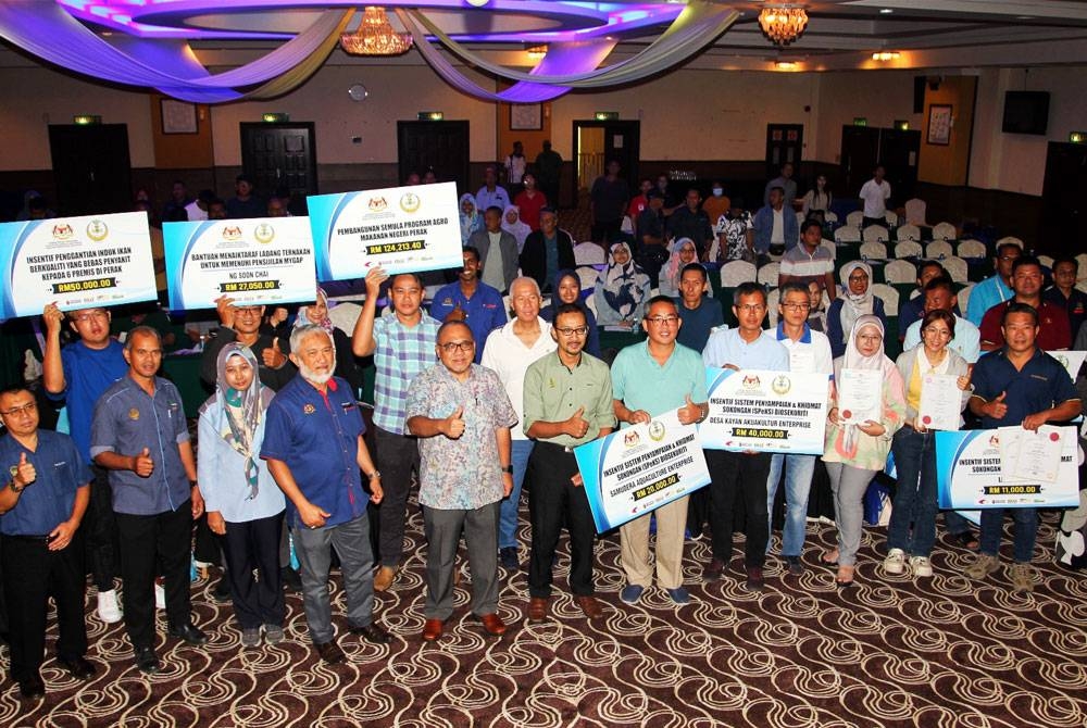 Sebahagian peserta yang mengikuti program Kesedaran Pematuhan Pensijilan MyGAP dan Taklimat Penggunaan Sistem eKanMas peringkat negeri Perak di Taiping pada Selasa.