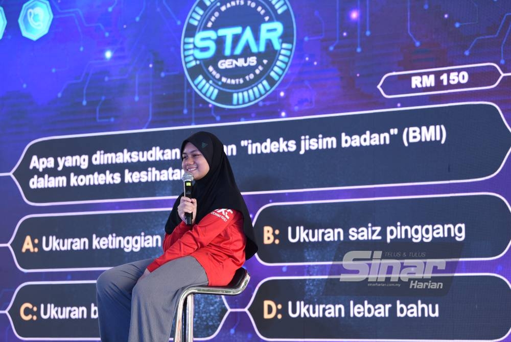 Madihah Nur Safiyyah Hanif Omar ketika menjawab soalan pada pusingan akhir pertandingan 'Who wants to be a Genius Star'.