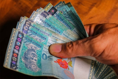 Ringgit ditutup rendah berbanding dolar AS dalam sentimen pasaran yang tenang pada Rabu. - Foto hiasan 123RF