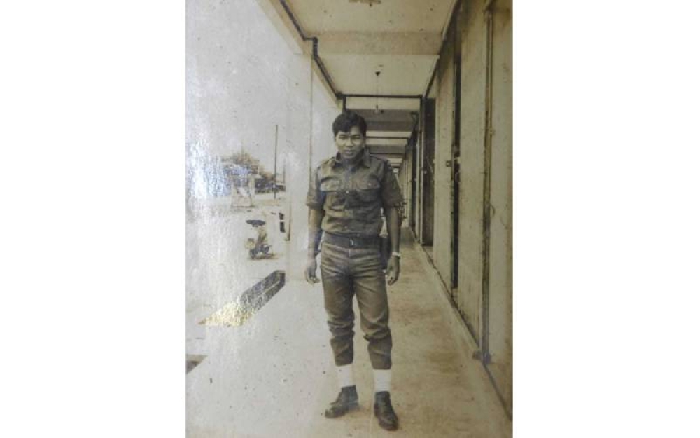 Foto lama Taijuddin yang kelihatan segak dengan memakai seragam lengkap pasukan VAT 69.