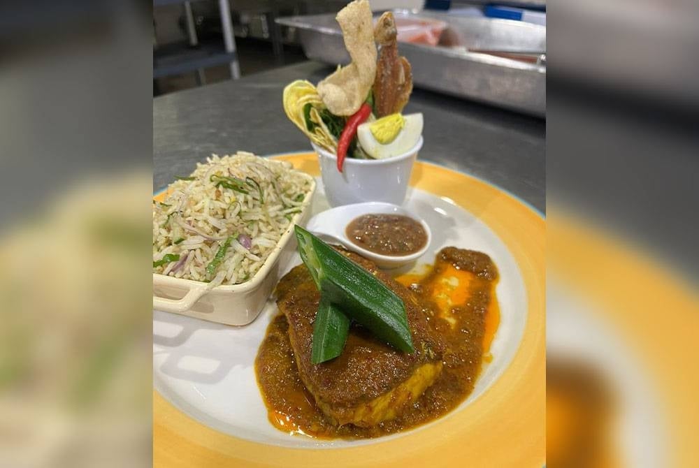 Hidangan asam pedas yang berjaya memenangi pingat emas.