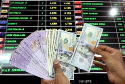 Ringgit dibuka rendah sedikit berbanding dolar AS pagi Khamis selepas Rizab Persekutuan AS (Fed) memutus untuk menangguhkan kenaikan kadar faedah. - Gambar hiasan
