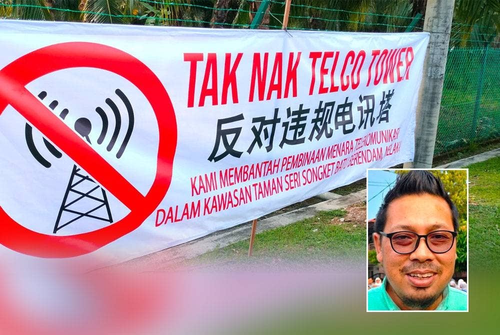 Kain rentang yang dipasang penduduk berhubung bantahan pembinaan menara telco di Taman Seri Songket, Batu Berendam. Gambar kecil: Zahiruddin