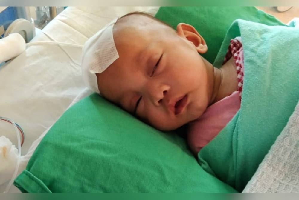 Muhamad Muzaffar Dannish menunggu masa sesuai untuk melakukan pembedahan pemasangan shunt kekal.