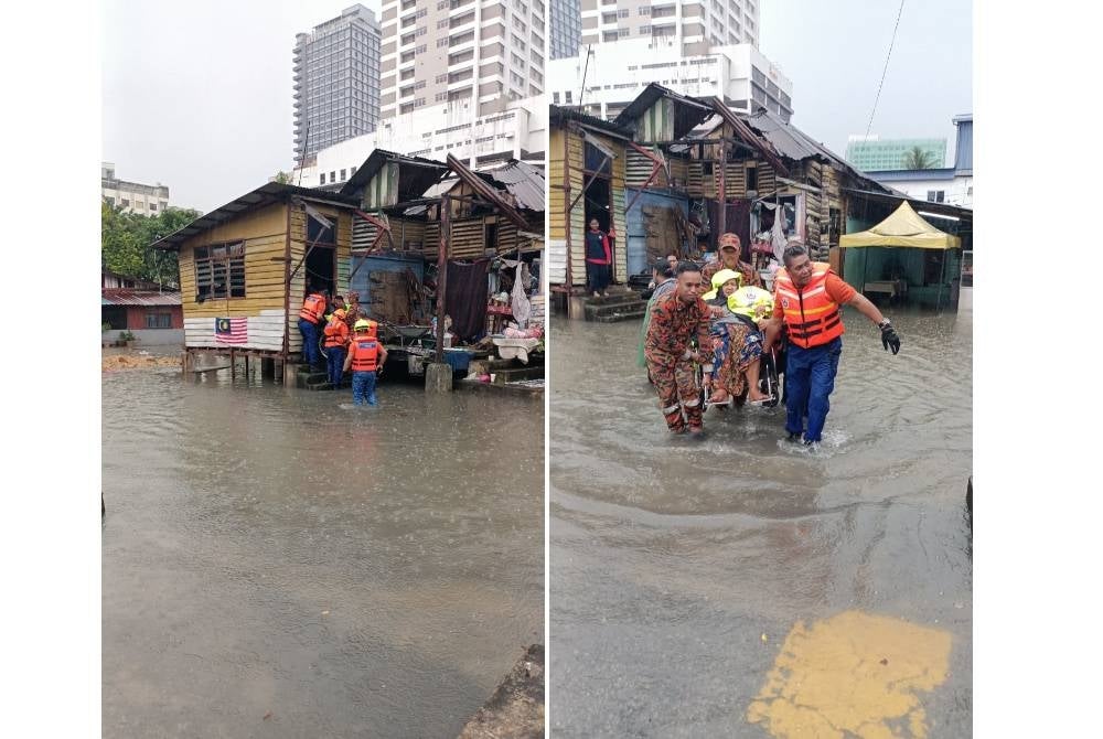 Operasi menyelamat warga emas terperangkap banjir di Kampung Periuk, Kampung Baru pada Selasa.