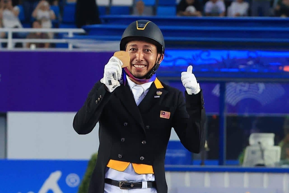 Jaguh equestrian, Qabil Ambak muncul antara pemenang pingat emas kontinjen Malaysia pada Sukan Asia Hangzhou 2022.